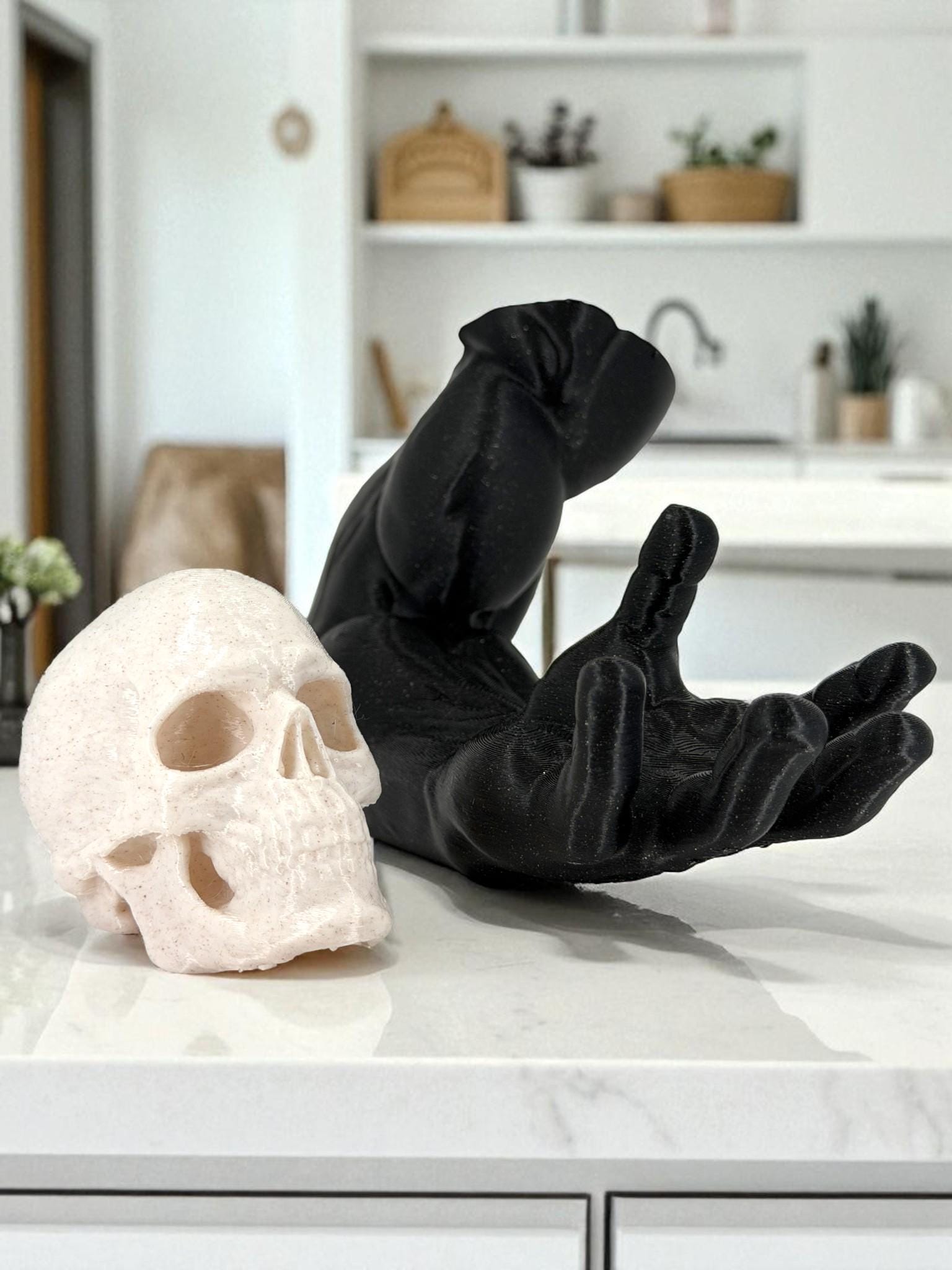 Skull in Hand Statue – Black Arm Gothic Sculpture