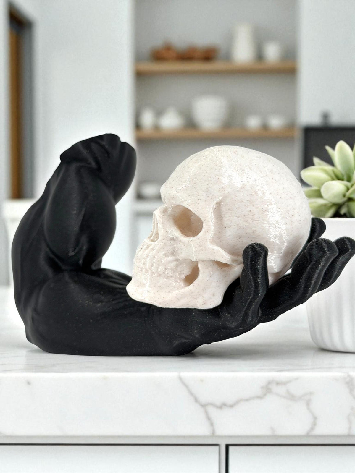 Skull in Hand Statue – Black Arm Gothic Sculpture